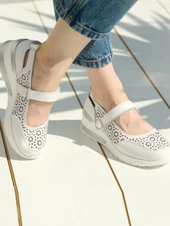 Babies à scratch en cuir