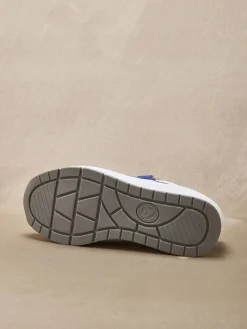 Baskets bicolores avec zip côté