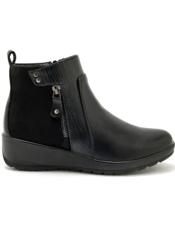 Boots fourrées compensées double zip