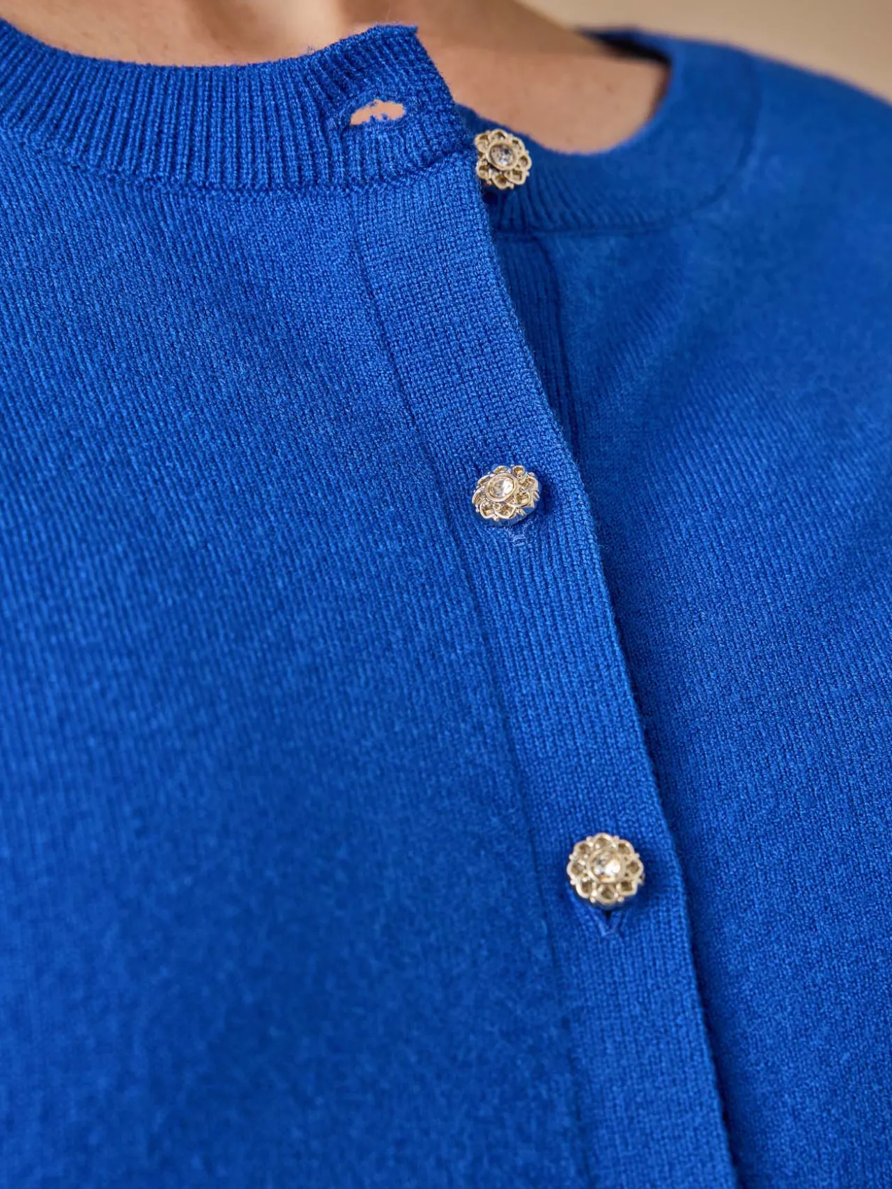 Cardigan élégant boutons-bijoux