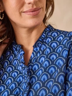 Chemisier en crêpe col montant volanté