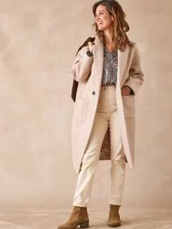 Manteau tissu bouclette