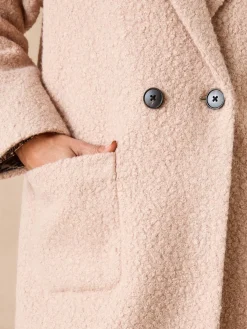 Manteau tissu bouclette