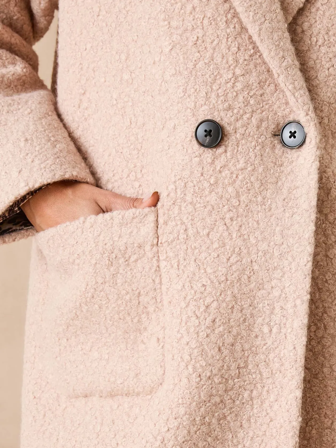 Manteau tissu bouclette