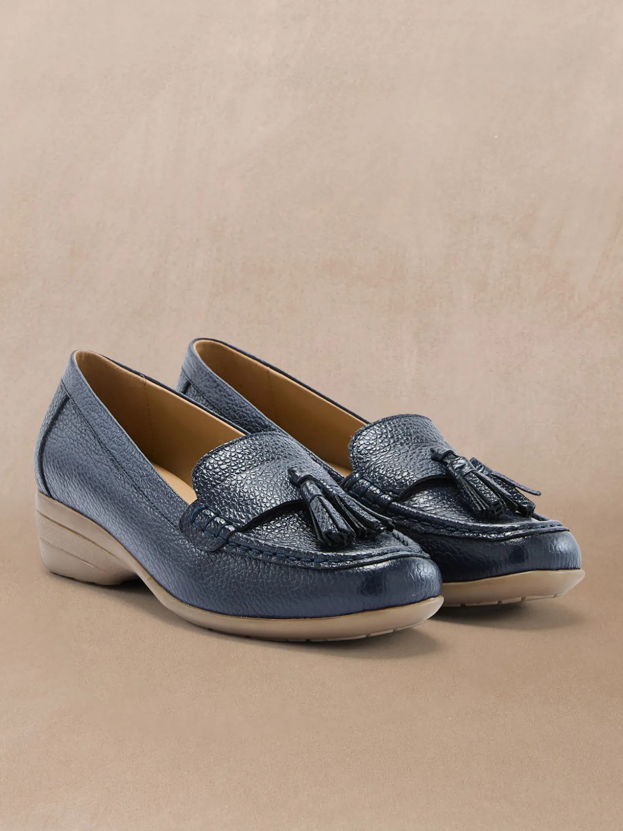 Mocassins à pompons