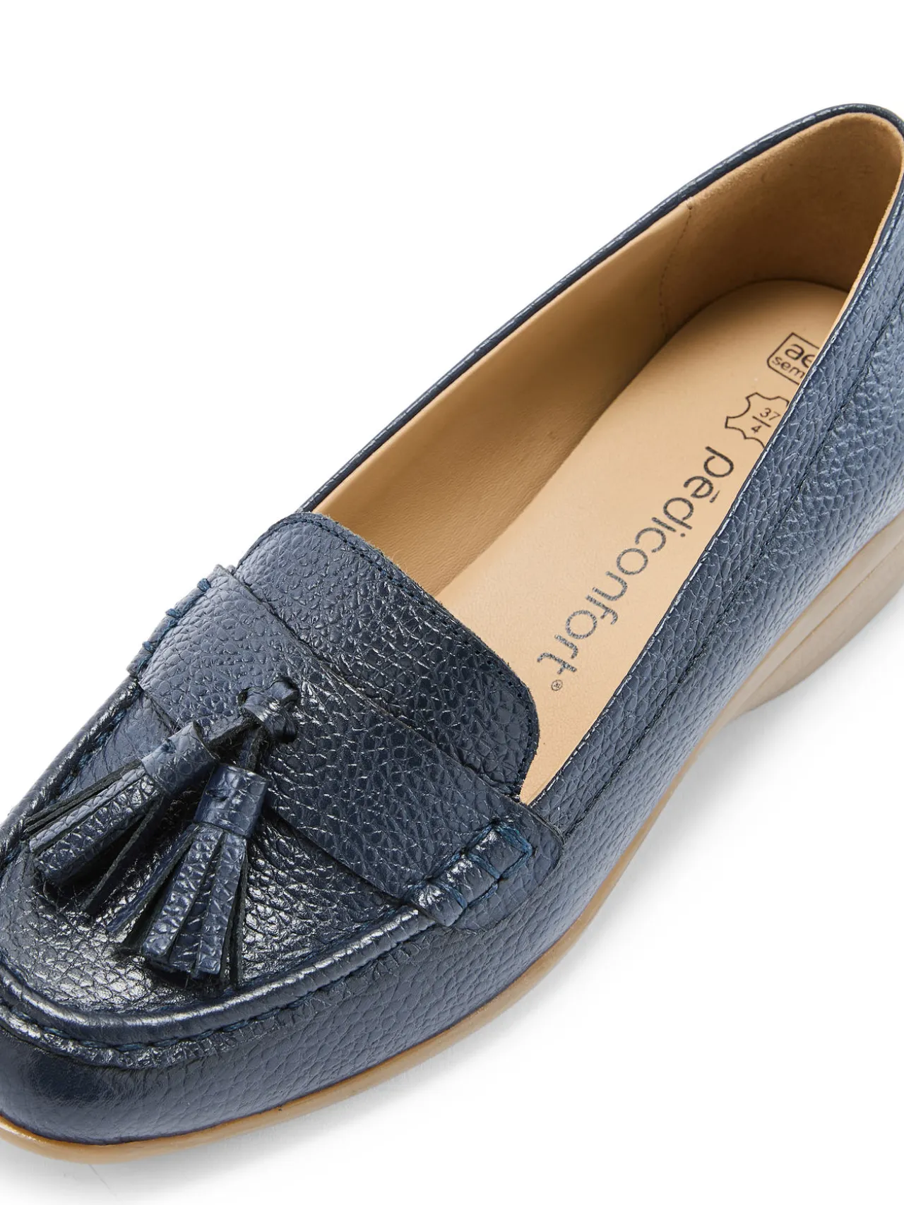 Mocassins à pompons