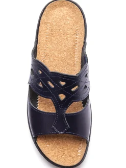 Mules à perforations fantaisie