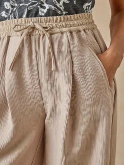 Pantalon large aspect froissé