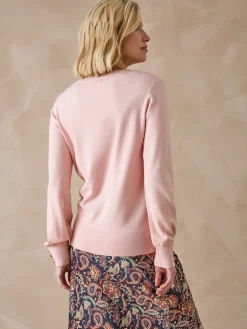 Pull boutons-bijoux aux manches