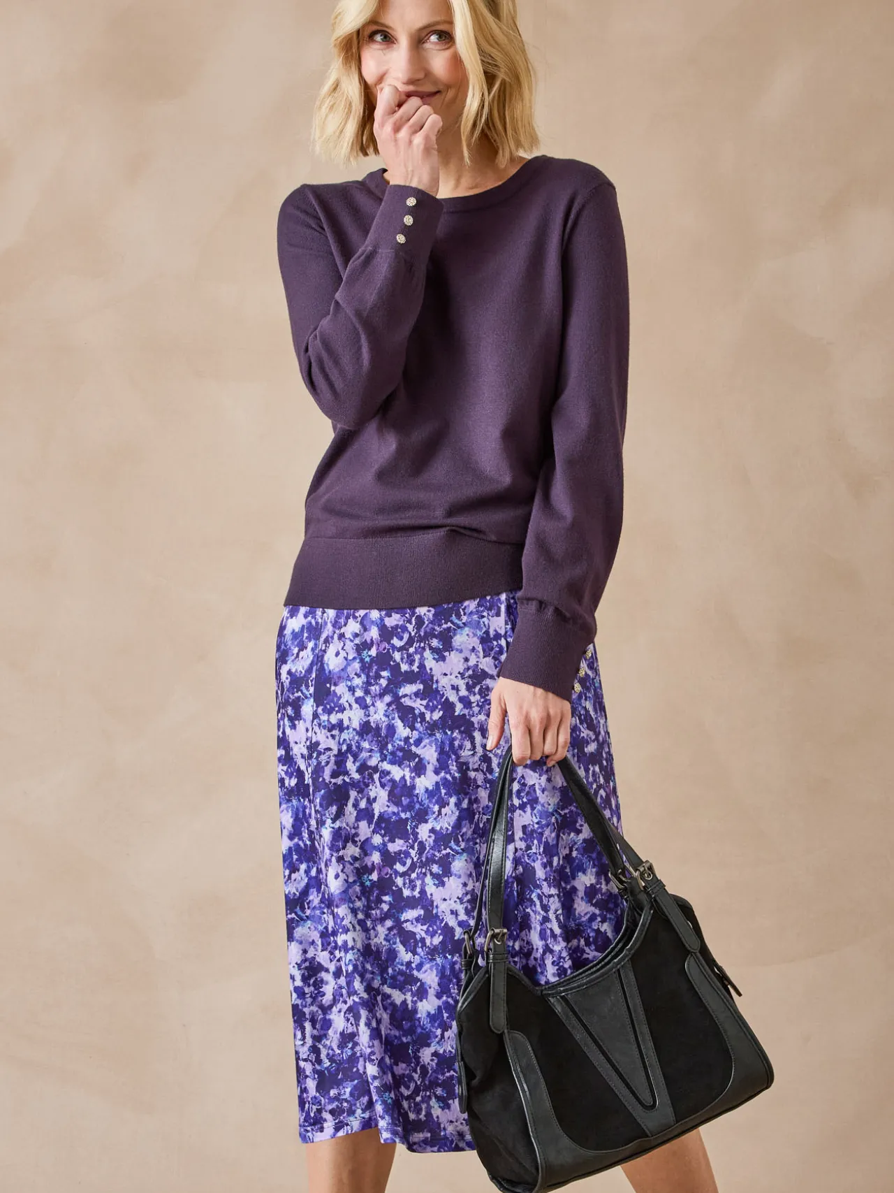 Pull boutons-bijoux aux manches