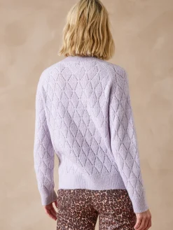 Pull maille fantaisie col montant