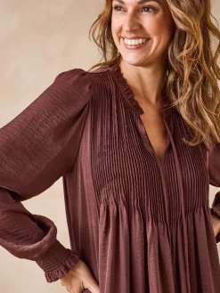 Robe à plis nervurés