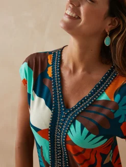 Robe en maille avec perles fantaisie