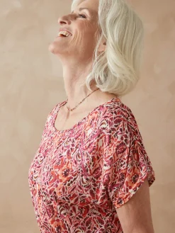 Robe encolure bateau en maille fluide