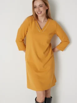 Robe housse en maille fluide