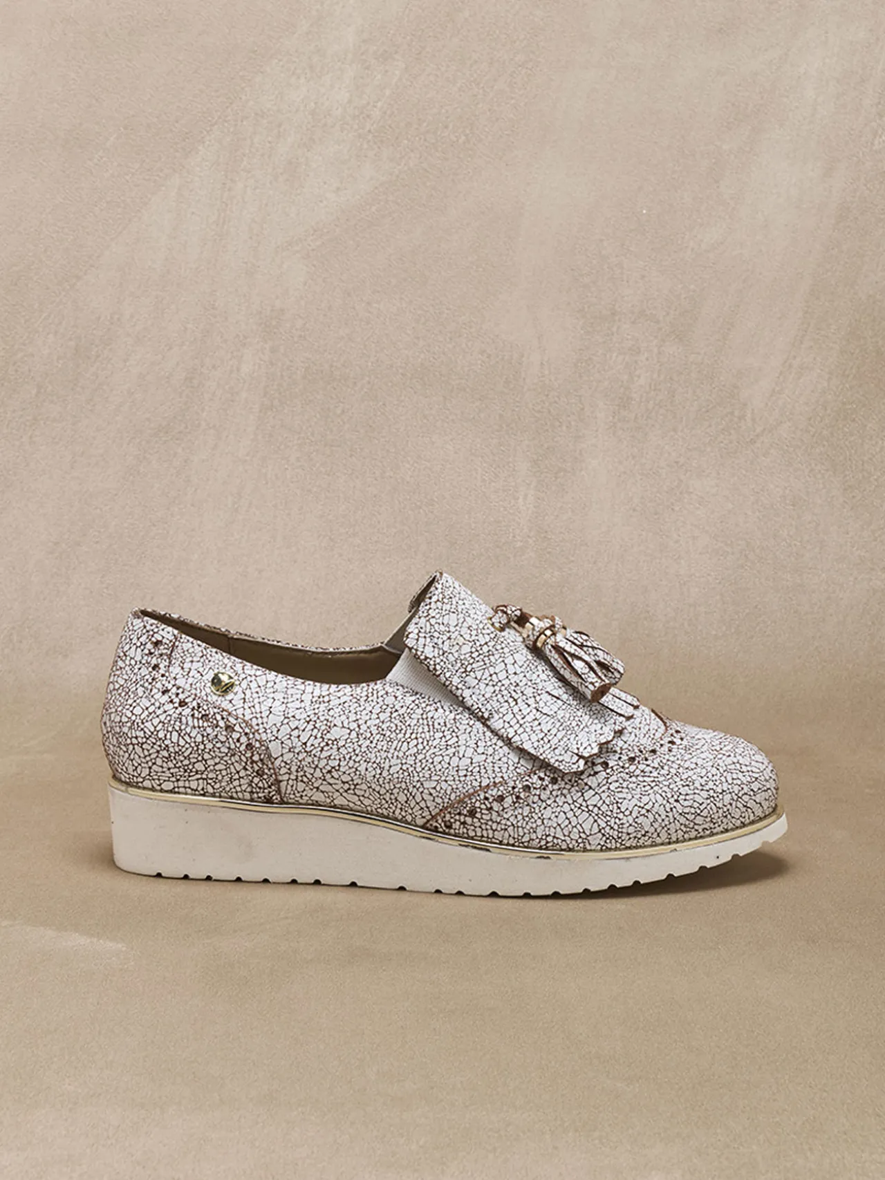 Sans-gêne à pompons élastiqués côtés