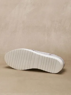 Sans-gêne à pompons élastiqués côtés