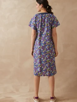 Tablier boutonné forme housse