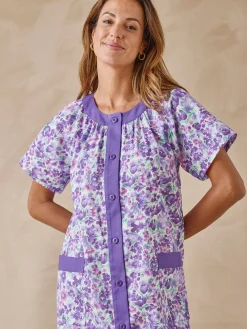 Tablier boutonné forme housse