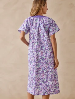 Tablier boutonné forme housse